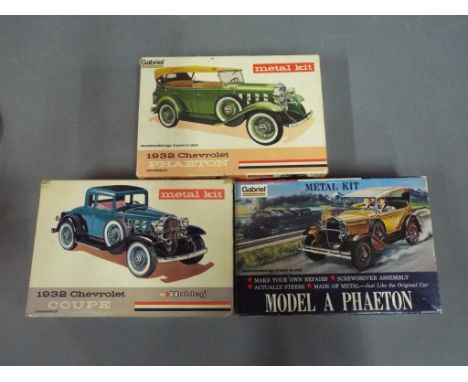 Hubley, Gabriel  - Three boxed Hubley / Gabriel  Metal 1:22 scale Model Kits.Lot consists of #4869-500 1932 Chevrolet Coupe; 