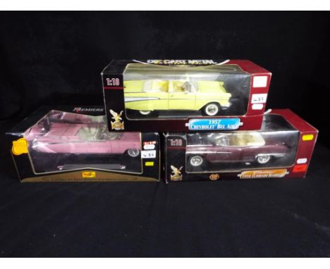 Maisto - a 1.18 scale Maisto diecast model motor vehicle premiere edition Cadillac and two Road Signature diecast vehicles, a