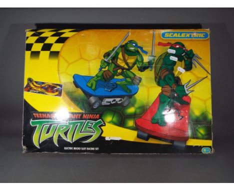 Retail Stock - a Scalextric Teenage Mutant Ninja Turtle box set, box has some creases.