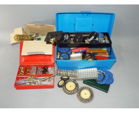 Meccano - A large quantity of vintage Meccano parts and accessories. All parts are in Playworn condition and are stored in 3 