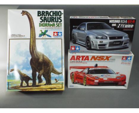 Tamiya - Three boxed Tamiya model kits in various scales. Lot consists of 1:35 scale no.6 Dinosaur Diorama Series Brachiosaur