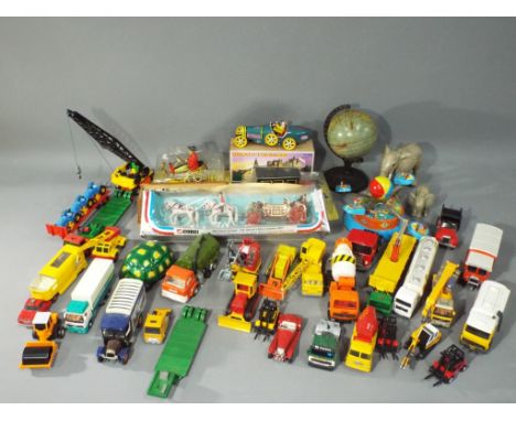 Corgi, Dinky, Matchbox, Buddy L and Others - In excess of 25 predominately unboxed diecast and tinplate model vehicles in var