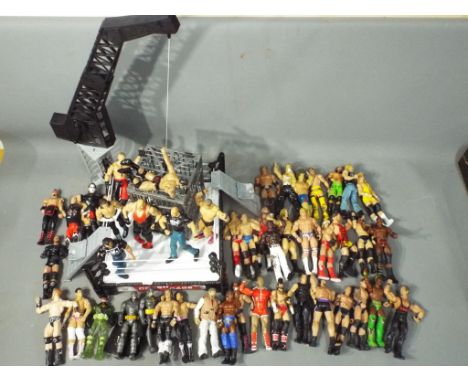 Mattel, JAKKS Pacific, WWE - A Mattell WWE unboxed Crash Cage, together with in excess of 50 predominately Jakks WWE Wresting