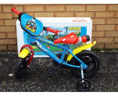 Thomas The Tank Engine - A boxed childrens 10'' framed Thomas the Tank Engine bicycle. Manufactured by Dino, the ex-shop stoc