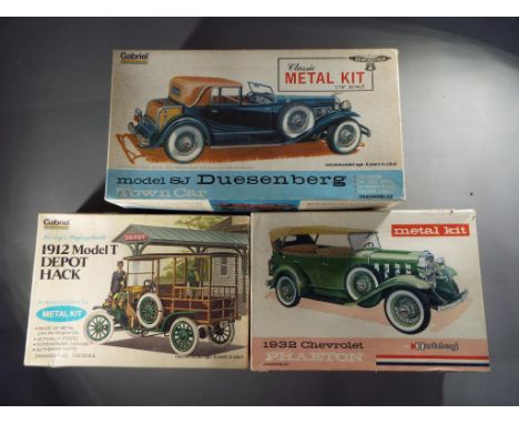 Hubley, Gabriel  - Three boxed Hubley/ Gabriel Metal 1:22 scale Model Kits.Lot consists of #4865-350 1932 Chevrolet Phaeton; 