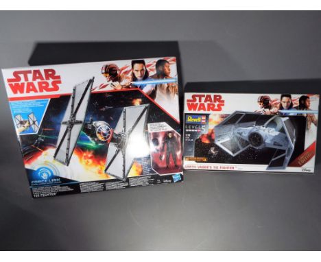 Retail Stock - a Disney Hasbro Star Wars Forcelink Tie Fighter with Tie Fighter pilot figure, also included in the lot is a S