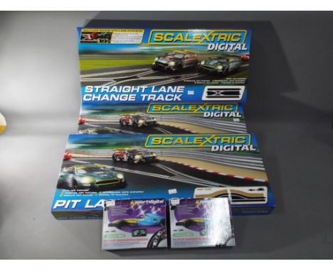 Scalextric - Five boxed Scalextric Digital Track accessories. Lot contains C7036 Straight Lane Change Track; C7014 Pit Lane T