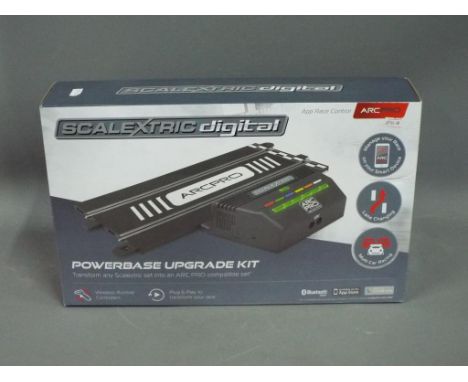 Scalextric - A boxed Scalextric C8435 ARC PRO Powerbase Upgrade Kit. The item is retail stock with a small tear to the front 