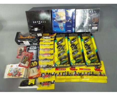 Ertl, Corgi, Kenner and Others - A mixed collection of over 20 boxed diecast model vehicles in various scales, model kits and