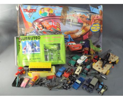 Dinky, Corgi, Matchbox, Subbuteo, Fisher Price  and Others - A quantity of playworn unboxed diecast model vehicles with a sel