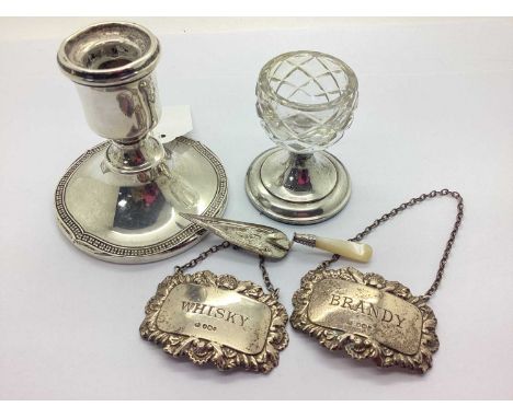 A Hallmarked Silver Dwarf Candlestick, HM, Birmingham 1925, with decorative wavy rim to circular spreading base, together wit
