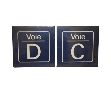 Two original French road/railway station enamel signs, Voie D and Voie C, blue ground and white text, both 32cm by 32cm.