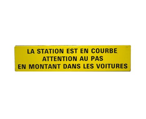 Original French railway station enamel sign 'La Station est en courbe attention au pas en montant dans les voitures', yellow 