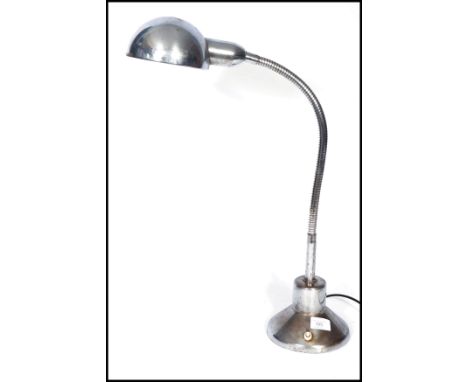 A vintage retro 20th century industrial anglepoise gooseneck desk lamp of tall form. The lamp of chrome construction with a l