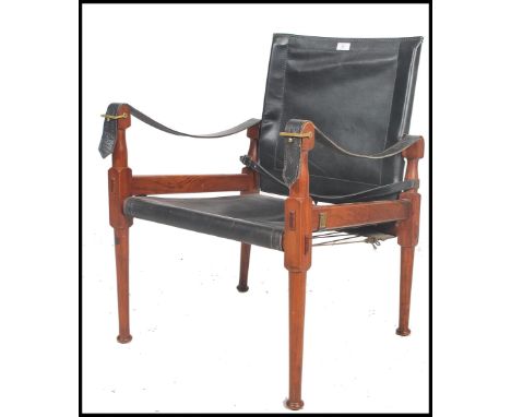 A vintage retro 20th century M Hayat Brothers Safari chair / Campaign teak and leather armchair after Kaare Klint, the teak w