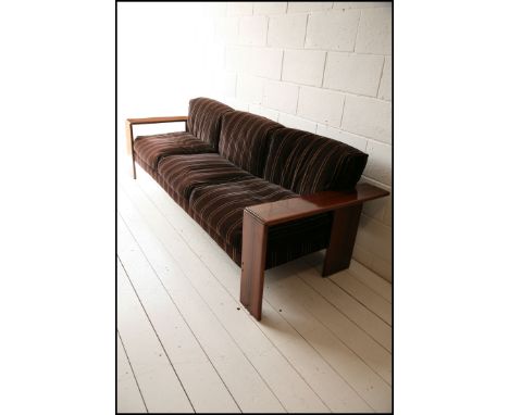 A rare 1970s 'Artona' dark wood sofa. Designed by Afra &amp; Tobias Scarpa for Maxalto. With original black and beige cushion