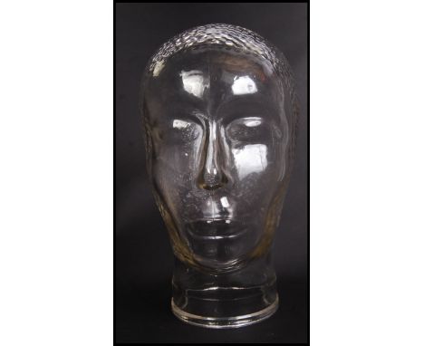 A 20th century moulded pressed glass phrenology type head - shop display stand / millinery mannequin head. Moulded and presse