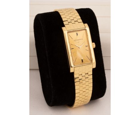 A Longines 18ct gold manual wind wristwatch, 1970s, the brushed effect gold face with gold hands and hour markers, original c