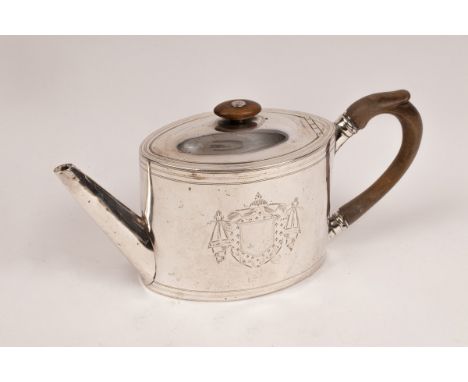 A George III silver teapot, Robert Hennell, London 1792, of oval shape with wooden finial and handle, engraved shield-shaped 