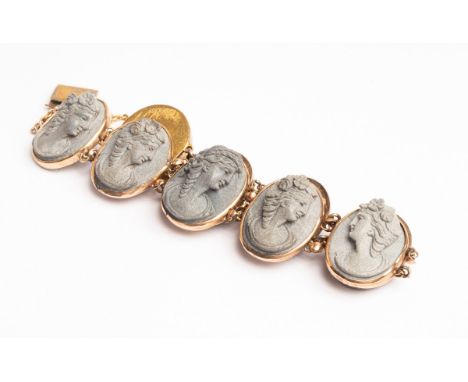 A Victorian lava cameo bracelet, with nine oval grey lava panels carved in relief depicting the profiles of maidens, with gil