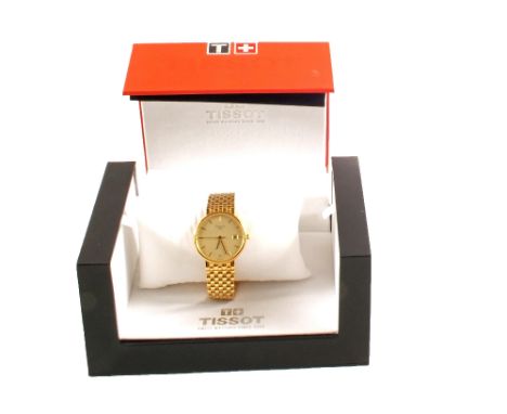 An 18ct Gold gents Tissot wristwatch with round case, champagne/baton dial, date window, centre seconds hand, Swiss quartz mo