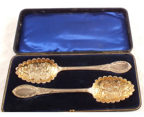 A cased set of Silver plated berry spoons plus a 19th Century trowel with inscription