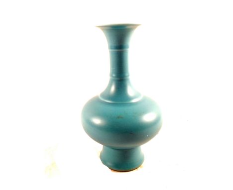 A Chinese powder blue low glazed narrow necked vase, seal mark, height 9" (with body repair)