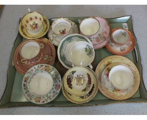 Various cups, saucers and trios (two trays)
