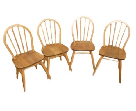 Set of four Ercol stick back dining chairs, labelled to underside B.S J.H 1960 256 (4) .Condition ReportThe chairs appear in 