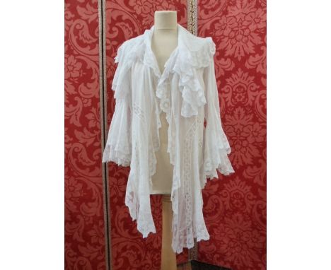 Edwardian morning blouse with lace trimmed lappets to the front, deep lace trimmed collar and lace inserts, sleeves forming a