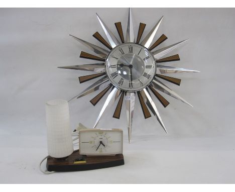 Metamec quartz sunburst-style wall clock in silver-coloured metal and wood-effect plastic rays, 60.5cm diameter and a Metamec