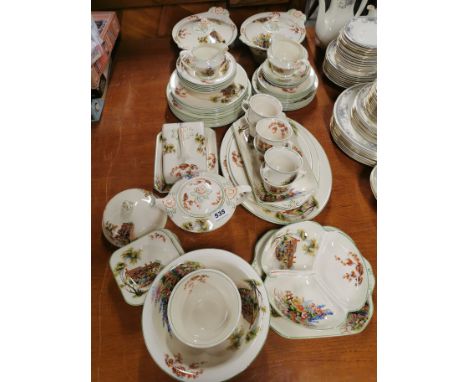 A very extensive vintage Woods Ivoryware cottage and flowers pattern dinner and tea service cc. 1930/40's.