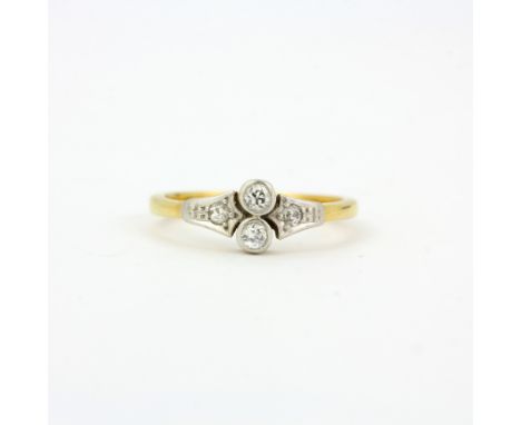A yellow and white metal ring (tested minimum 9ct gold) diamond set ring, (M).