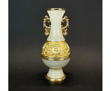 A Chinese carved and gilt mounted jade /hardstone presentation vase, H. 18cm.