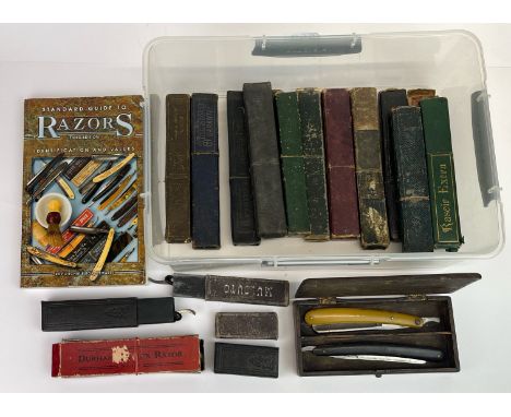 A quantity of razors and razor cases ( some empty ).