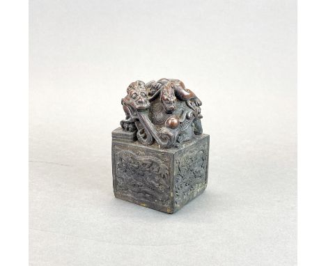 A Chinese bronze scholar's seal, H. 13cm.
