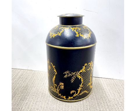 A toleware tea caddy, H. 35cm.