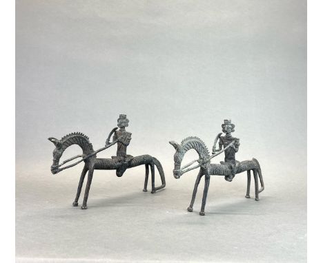 A rare pair of bronze figures of horses and riders with Scimitars, L. 33cm. H. 19cm. Prov F. Collins collection.