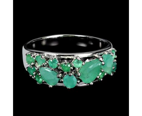 A 925 silver ring set with emeralds, ring size N.