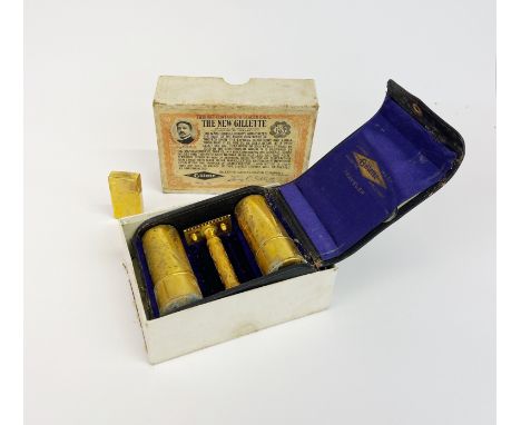 A boxed antique New Gillette razor.