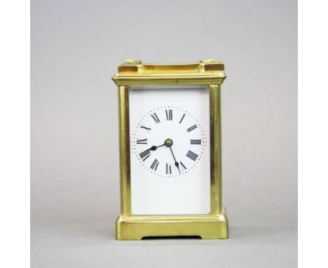 A brass carriage clock, H. 14cm.