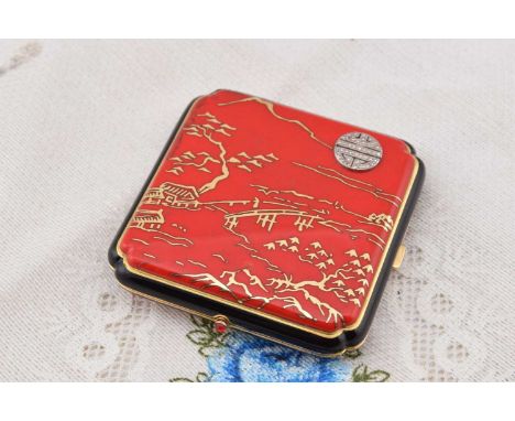 A La Cloche Freres Paris c1925 square 18ct gold and enamelled square compact, having red enamelled hinged lid with gilt orien