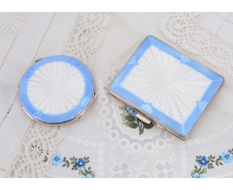 A George V matching rectangular and circular guilloche enamel compact set, both compacts having blue guilloche enamel borders