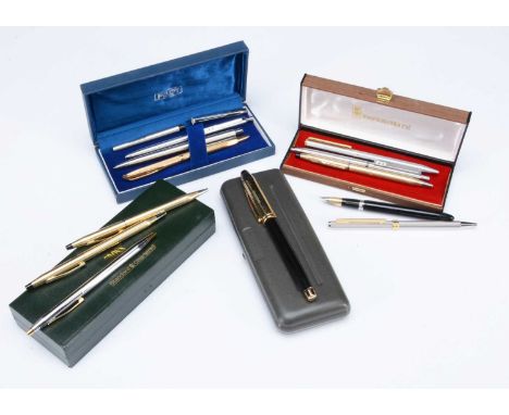 A small collection of pens, including several by Cross, Papermate and others including a Christian Dior biro