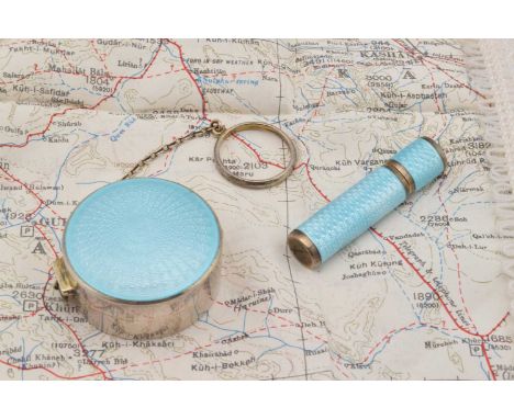A Sterling marked blue guilloche enamel circular hinged lidded pot, having chain and finger ring, with powder and puff, 3.5cm