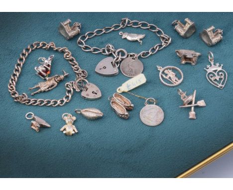 A silver charm bracelet, the curb links set with a silver coin charm another curb link bracelet and a collection of loose sil
