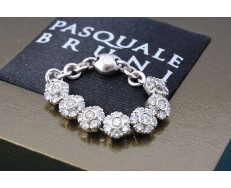 A Pasquale Bruni 18ct gold flori diamond chain ring, 1.69ct diamonds in seven clusters, ring size S, 5.7g with a Hartfields N