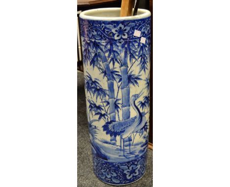 An oriental blue and white ceramic stick stand;a hickory shafted maxwell mashie golf club; a Geo Nicoll leview pin splitter; 