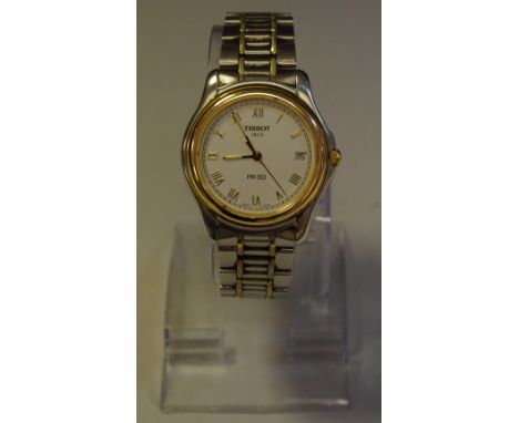 A gentleman's Tissot stainless steel wrist watch, extra links