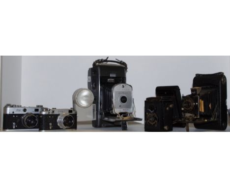 Photographic interest - a Polaroid Land Camera Model 160, folding bellows WINK-Light; a Voigtlander Brilliant box camera; a N